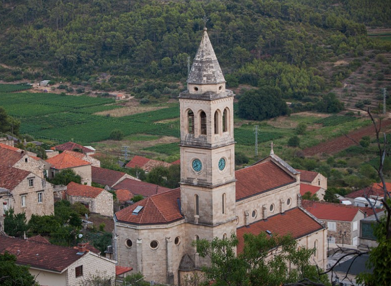 The Smokvica parish bell-tower above the village