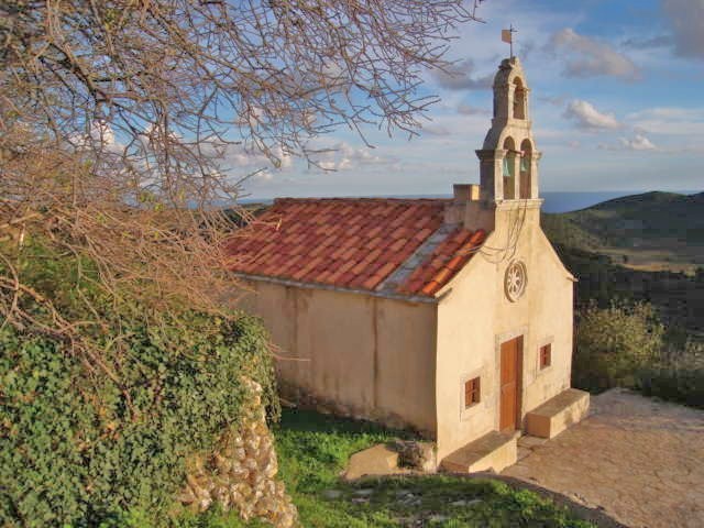 A field chapel at golden hour